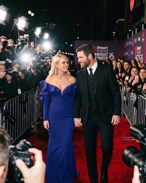Carrie Underwood and Mike Fisher Ignite Red Carpet Frenzy at iHeartRadio Music Awards 2026