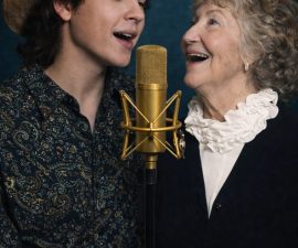 “Echoes of Love”: John Foster and His Mother — A Hidden Generational Duet Where Grit Meets Grace“Echoes of Love”: John Foster and His Mother — A Hidden Generational Duet Where Grit Meets Grace